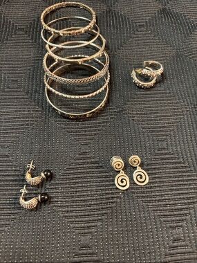 Silver tone misc costume jewelry.  Silver tone